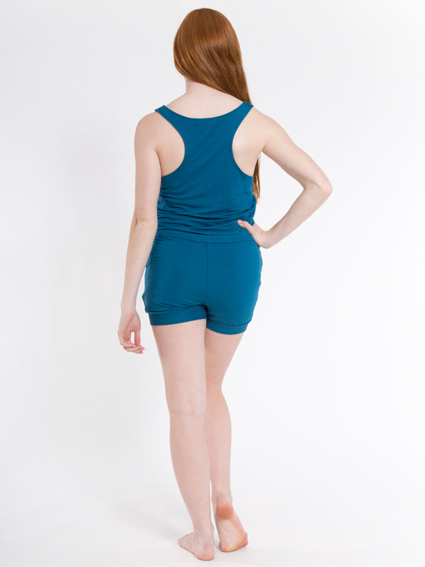 Blue Shorts Romper: Romper in Peacock Blue by Sugar and Bruno Apparel in Indianapolis, IN